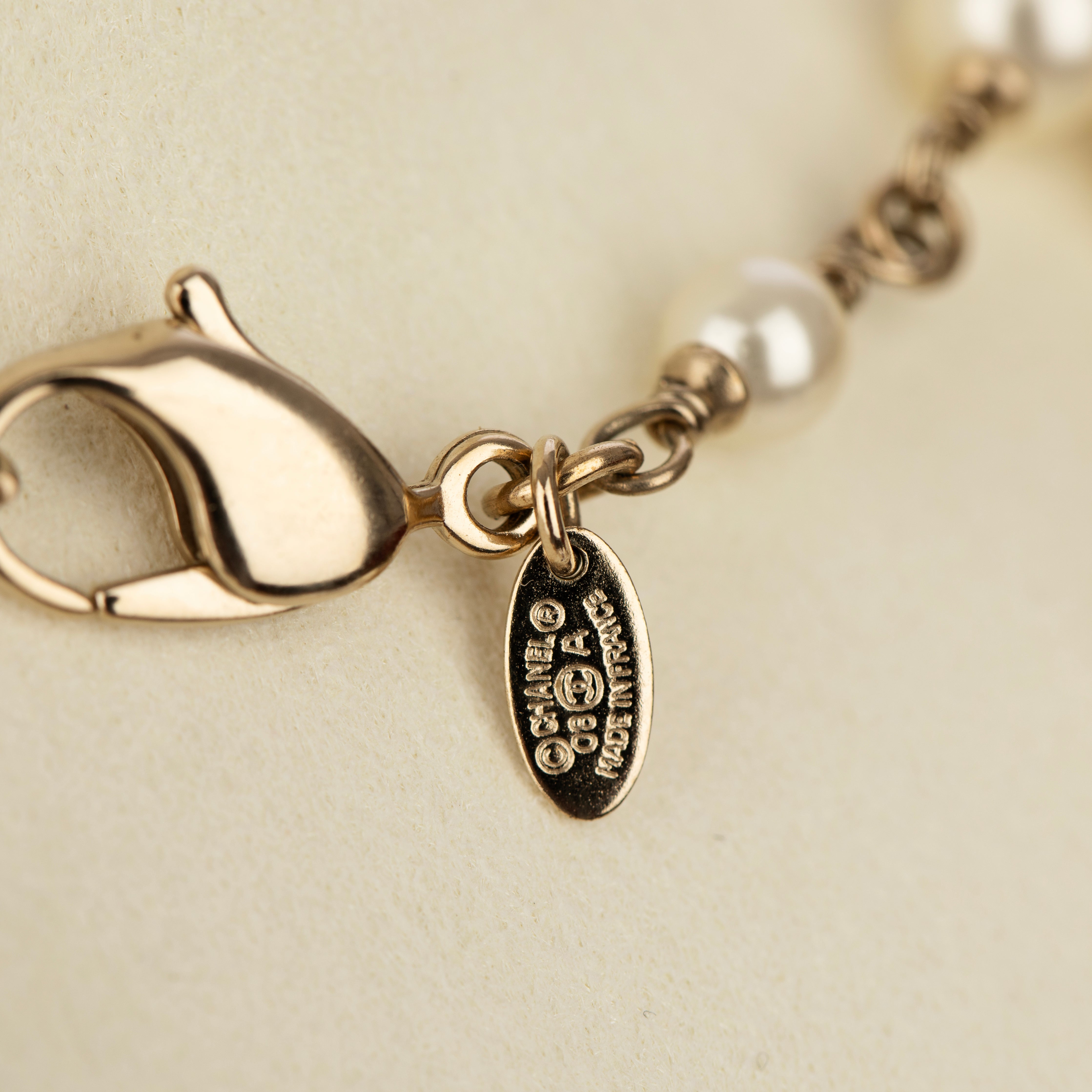 Chanel Faux Pearl 124cm Necklace with Gold Tone CC Charm