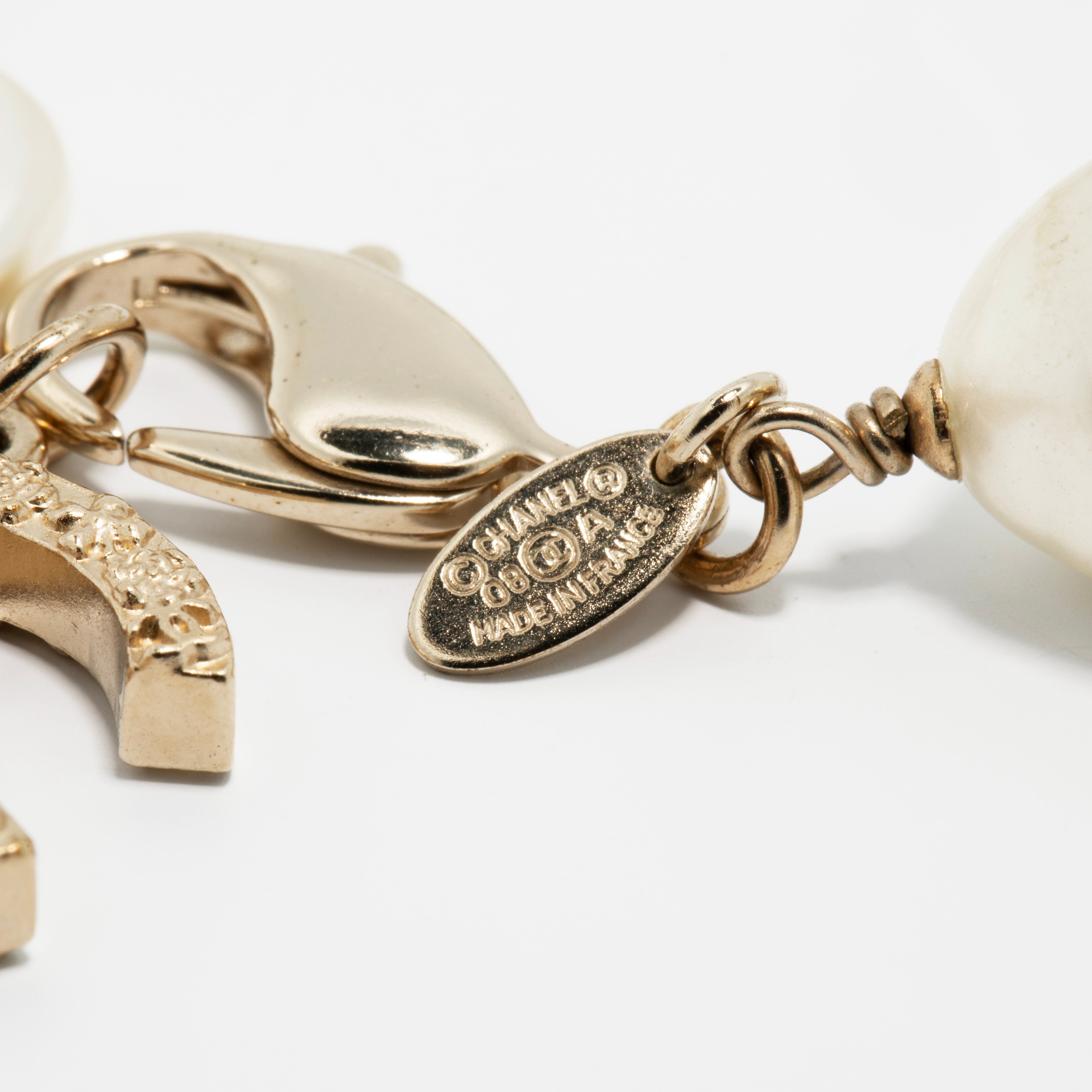 Chanel Faux Pearl Bracelet with Gold Tone CC Charm