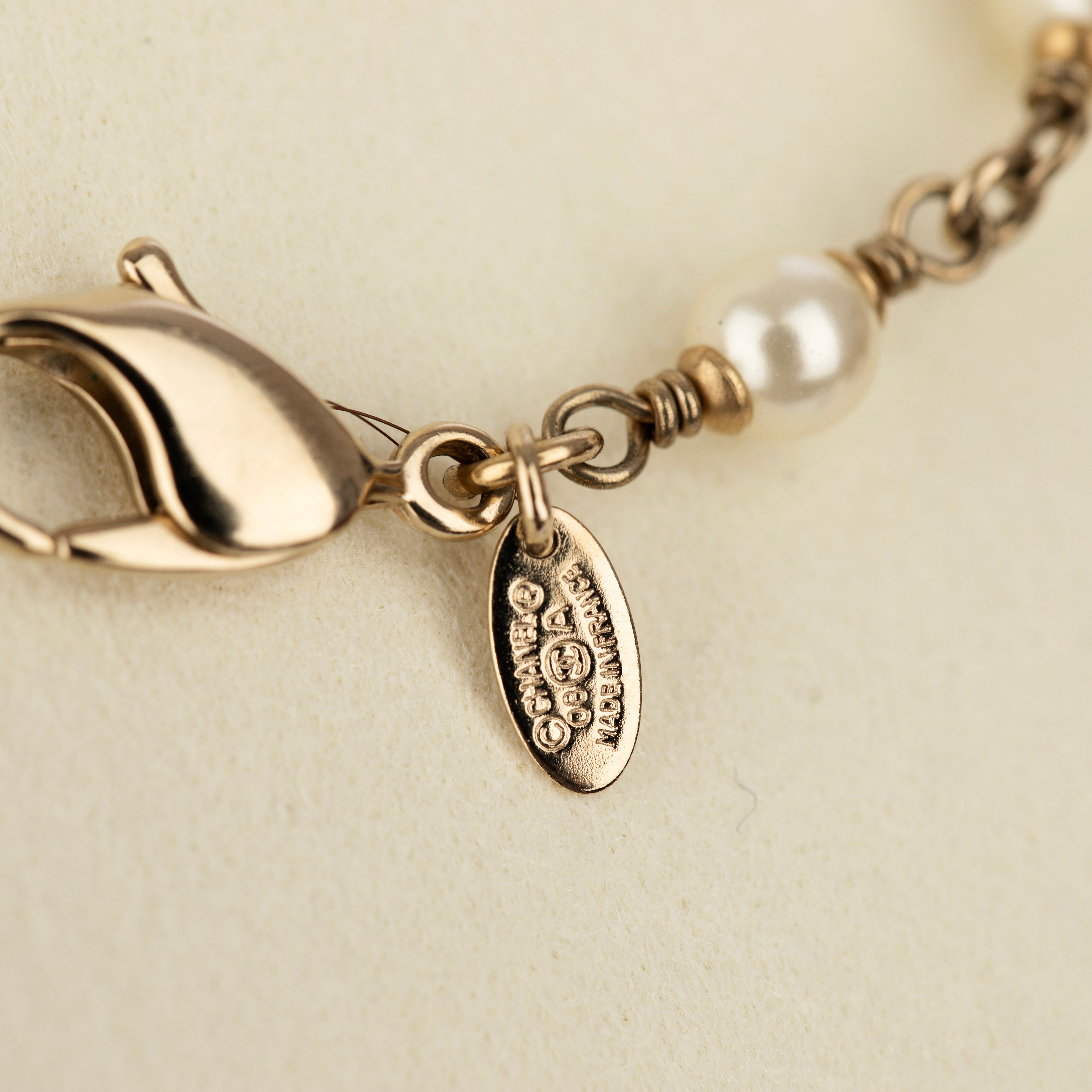 Chanel Faux Pearl 124cm Necklace with Gold Tone CC Charm