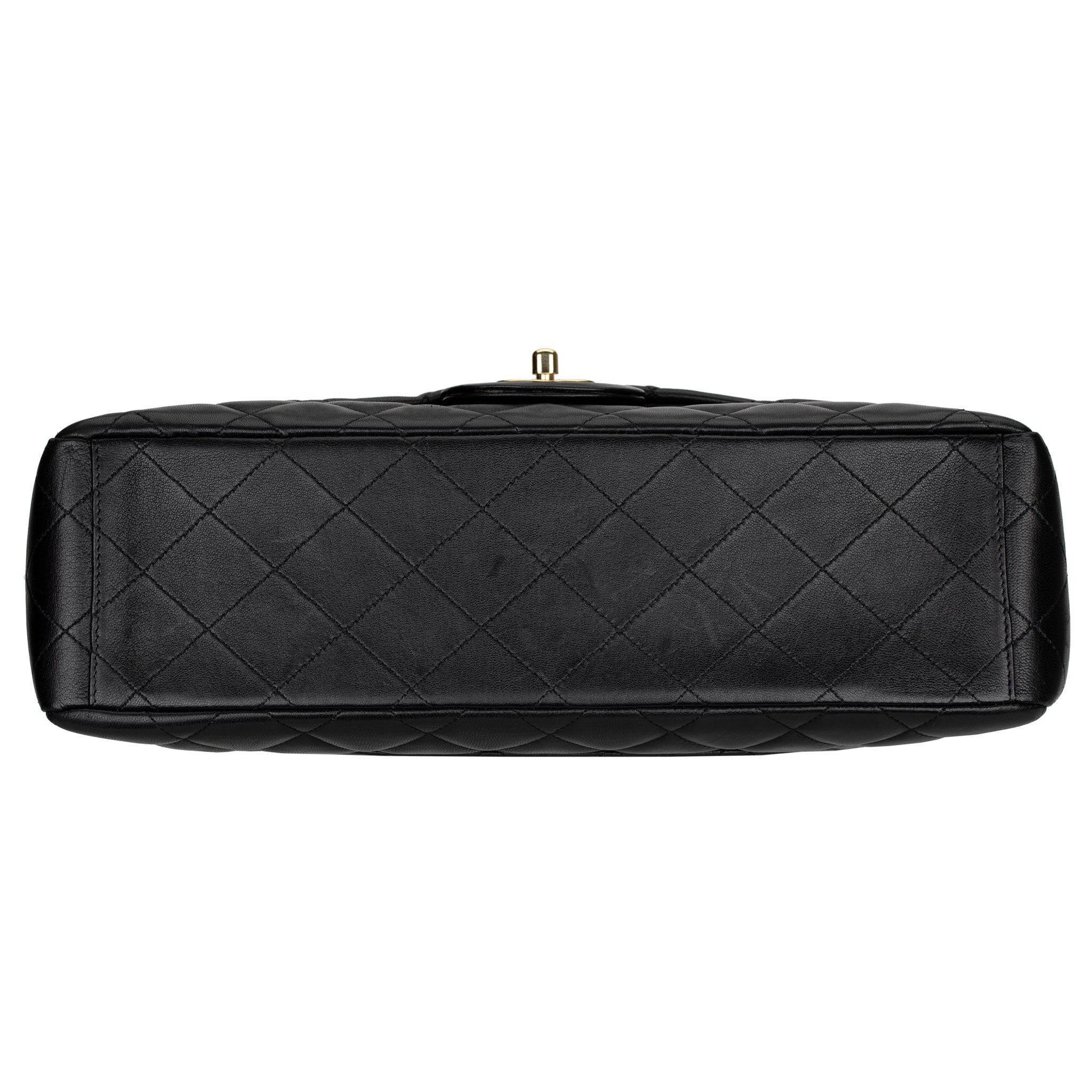CHANEL MAXI CLASSIC FLAP BLACK QUILTED LAMBSKIN LEATHER GOLD-TONE HARDWARE - On Repeat