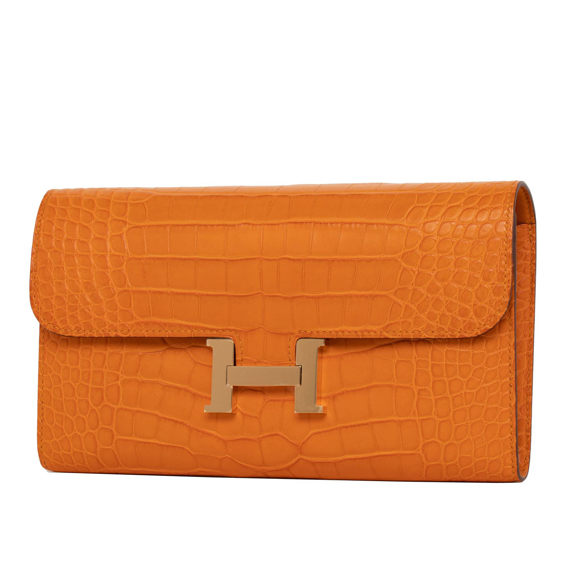 HERMES CONSTANCE WALLET ABRICOT MATTE ALLIGATOR GOLD HARDWARE - On Repeat