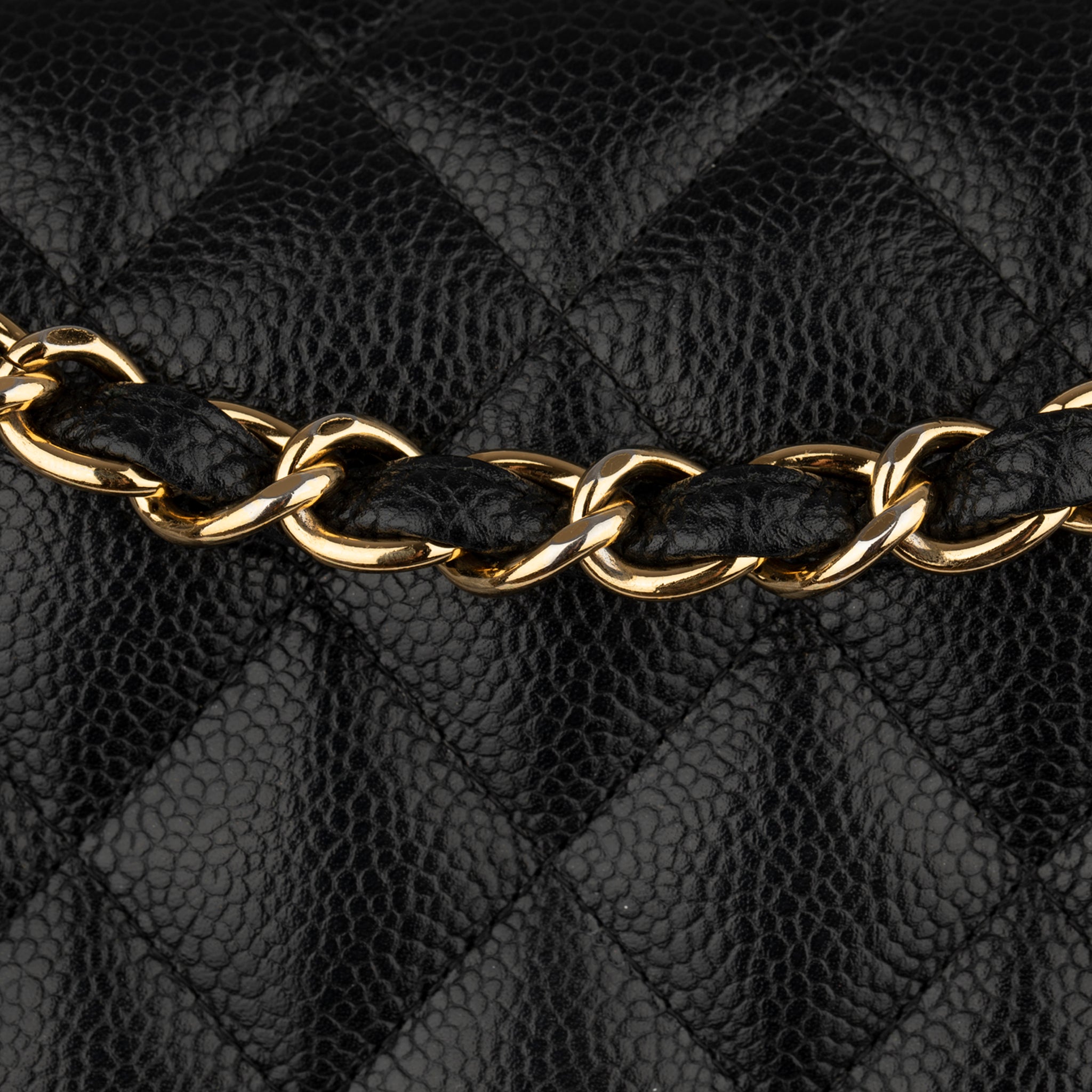 CHANEL CLASSIC JUMBO DOUBLE FLAP BLACK QUILTED CAVIAR LEATHER GOLD-TONE HARDWARE - On Repeat