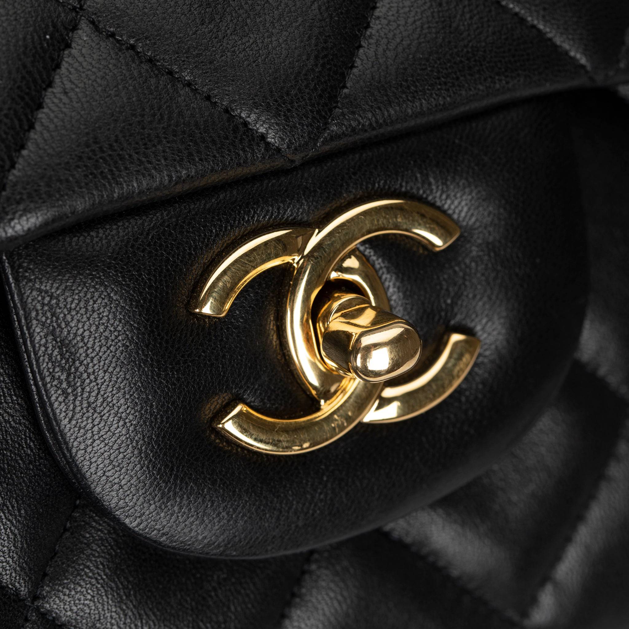 CHANEL MAXI CLASSIC FLAP BLACK QUILTED LAMBSKIN LEATHER GOLD-TONE HARDWARE - On Repeat