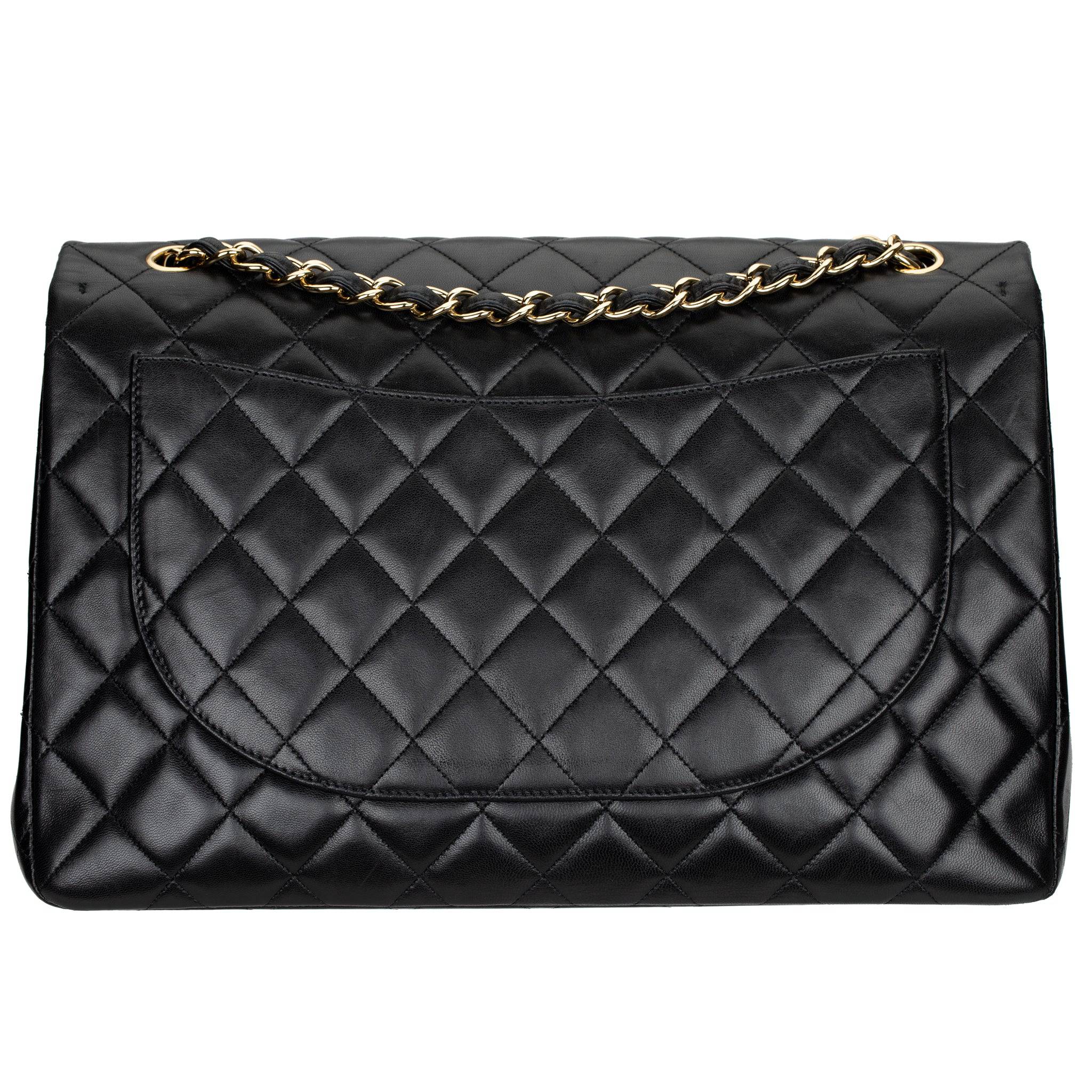 CHANEL MAXI CLASSIC FLAP BLACK QUILTED LAMBSKIN LEATHER GOLD-TONE HARDWARE - On Repeat