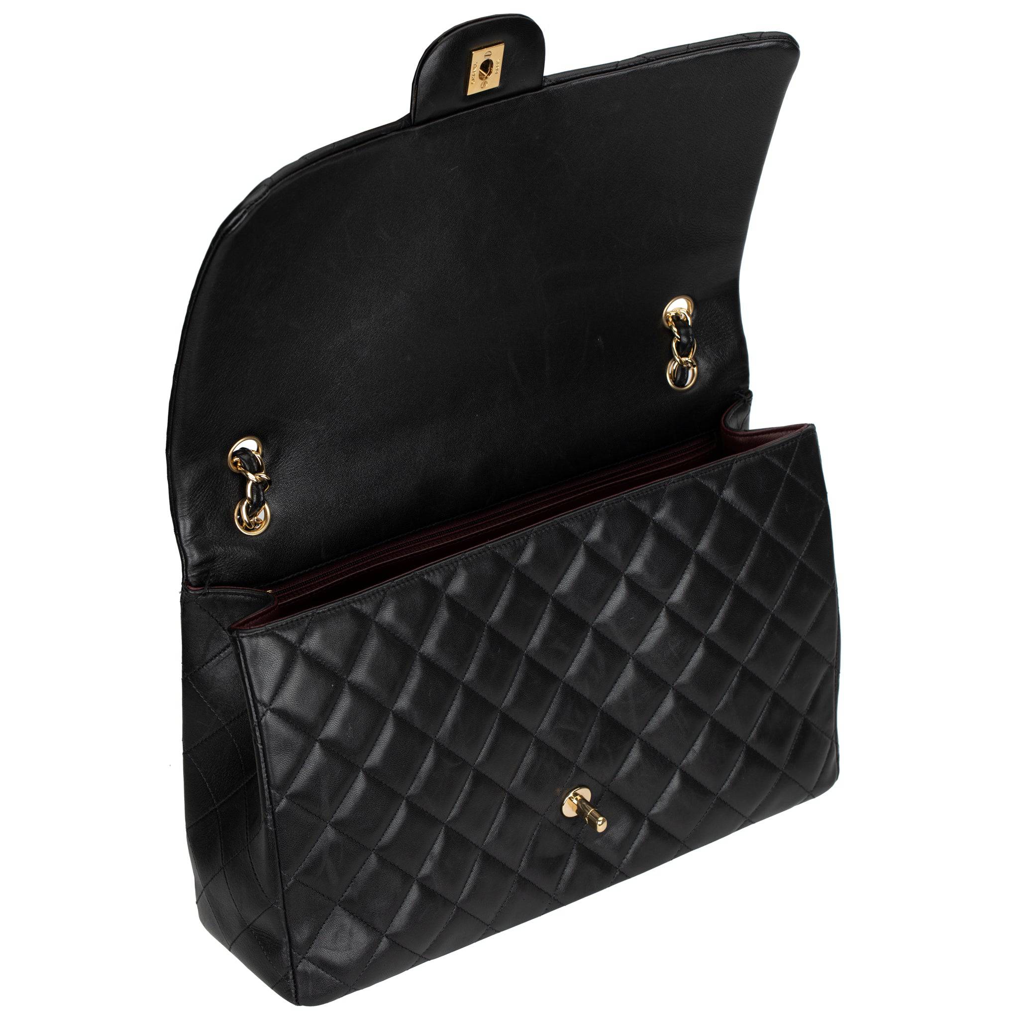 CHANEL MAXI CLASSIC FLAP BLACK QUILTED LAMBSKIN LEATHER GOLD-TONE HARDWARE - On Repeat