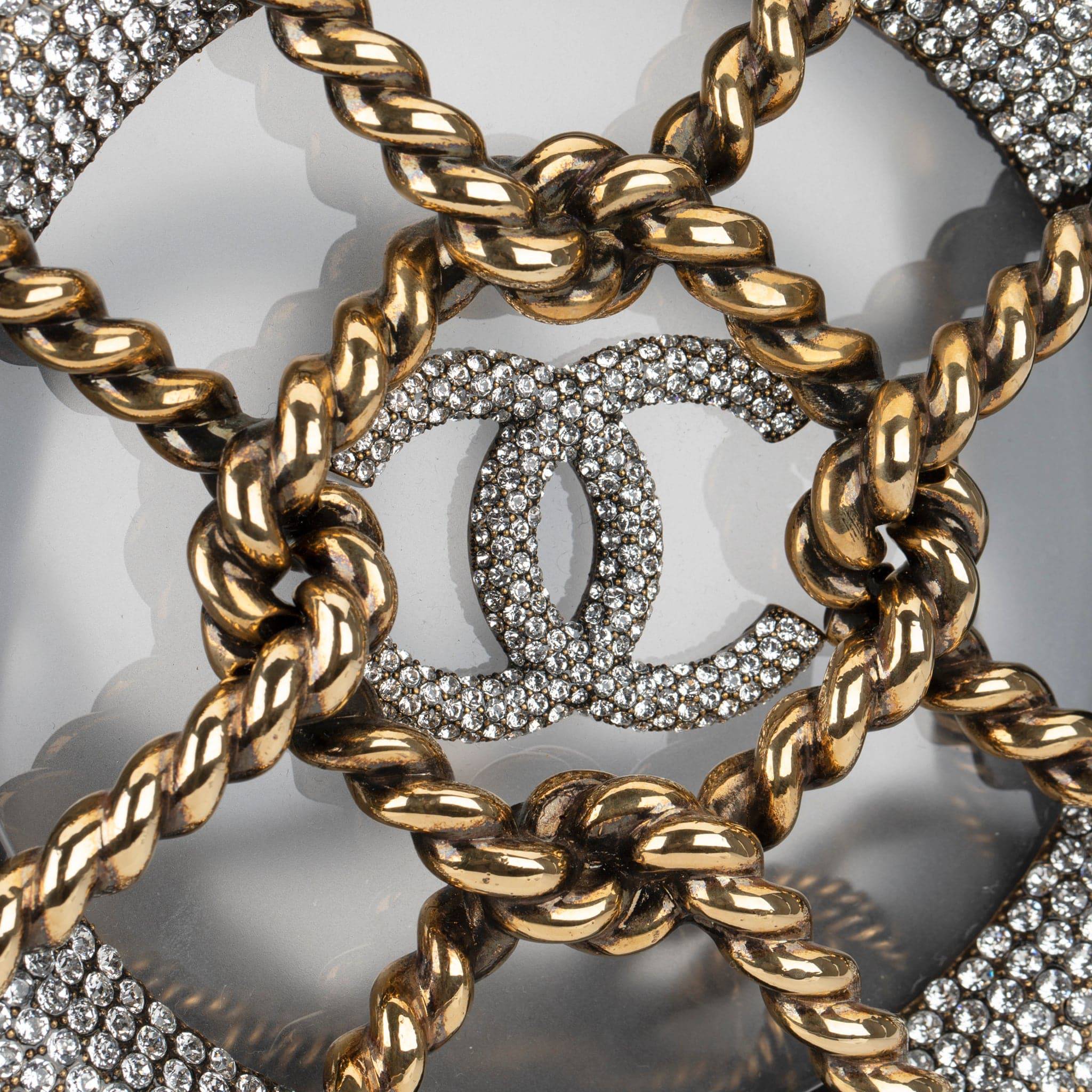 CHANEL MINAUDIÈRE LIMITED EDITION BLACK, GOLD & CLEAR RESCUE WHEEL GOLD-TONE HARDWARE - On Repeat