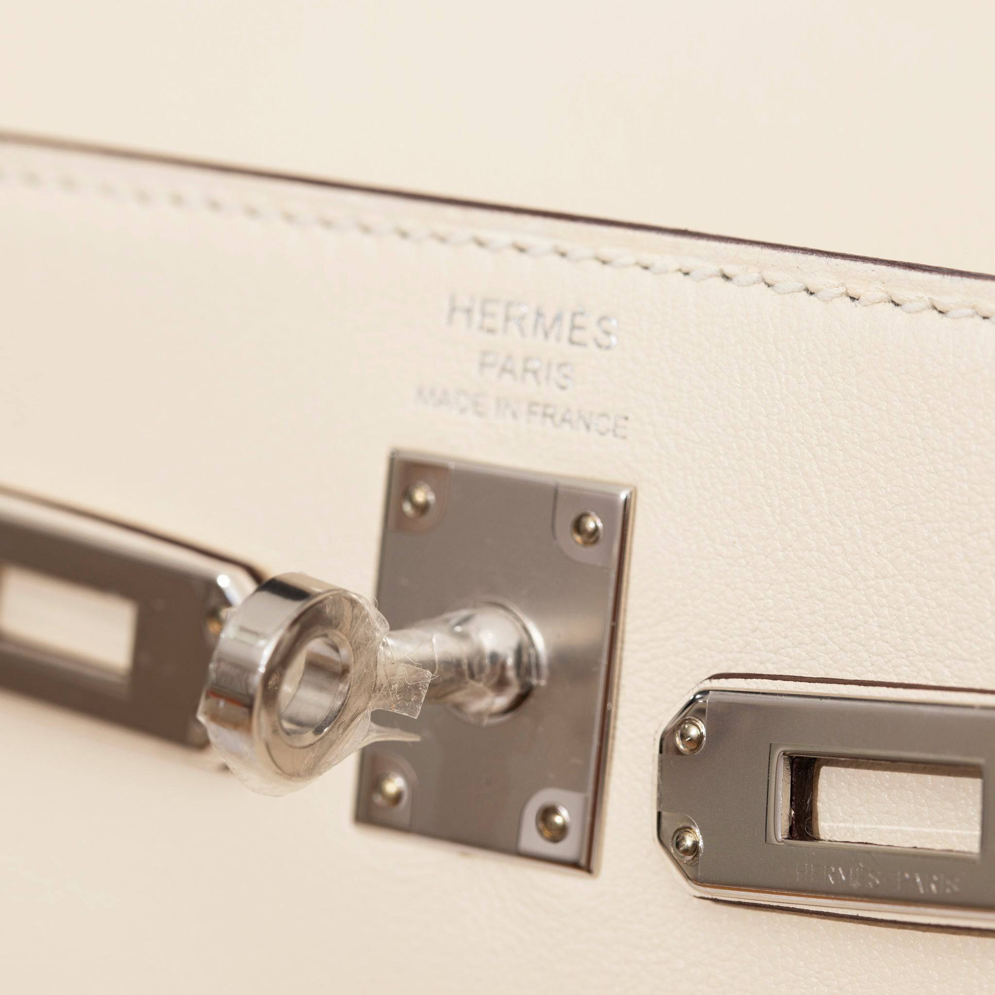 HERMES KELLY 25CM LIMITED EDITION "IN AND OUT" NATA SWIFT LEATHER PALLADIUM HARDWARE - On Repeat